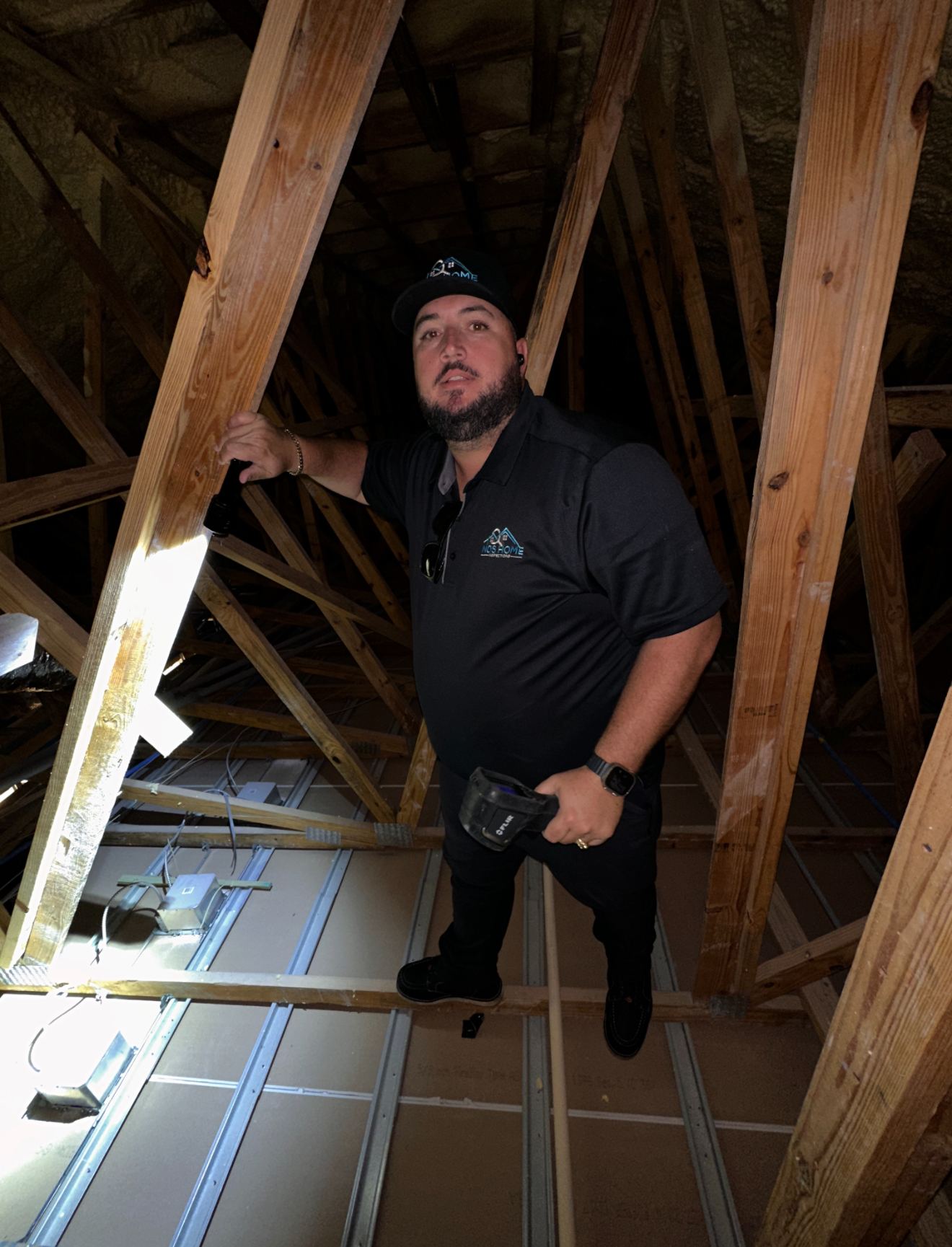 Inspector checking an attic